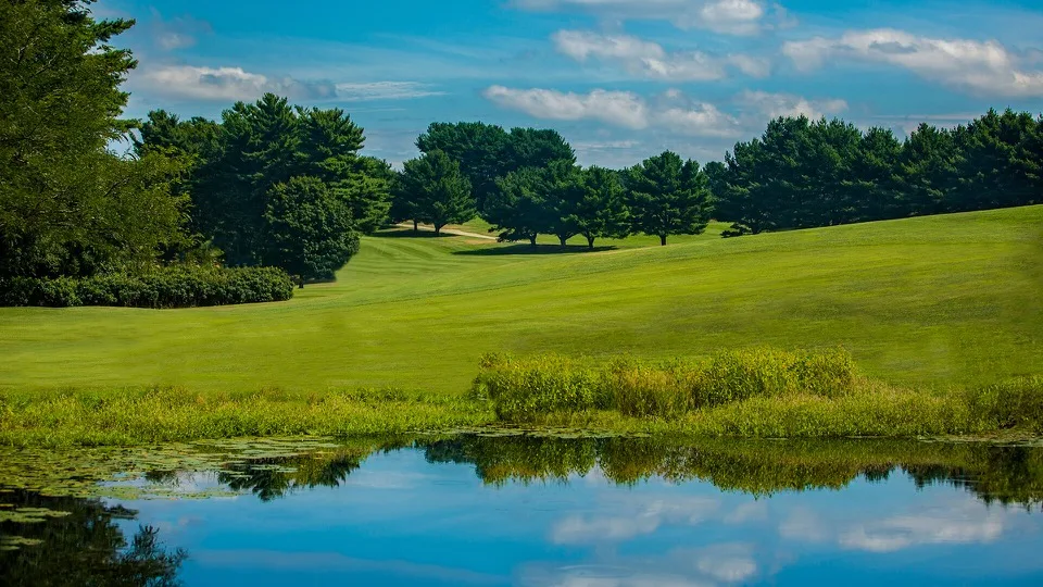 Scenic pond reflection at North Hill Country Club